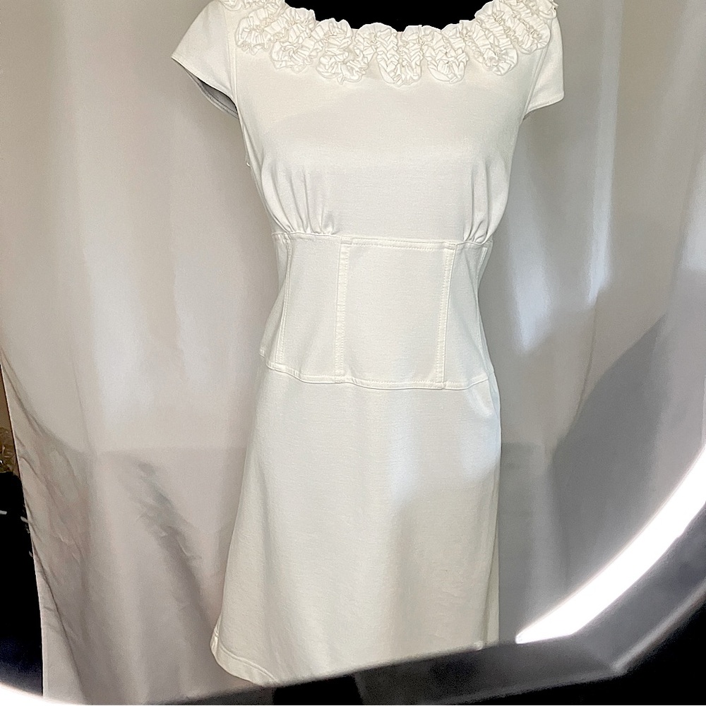 Women's Cream colored Tempo Paris size L 95% polyester 5% Spandex.